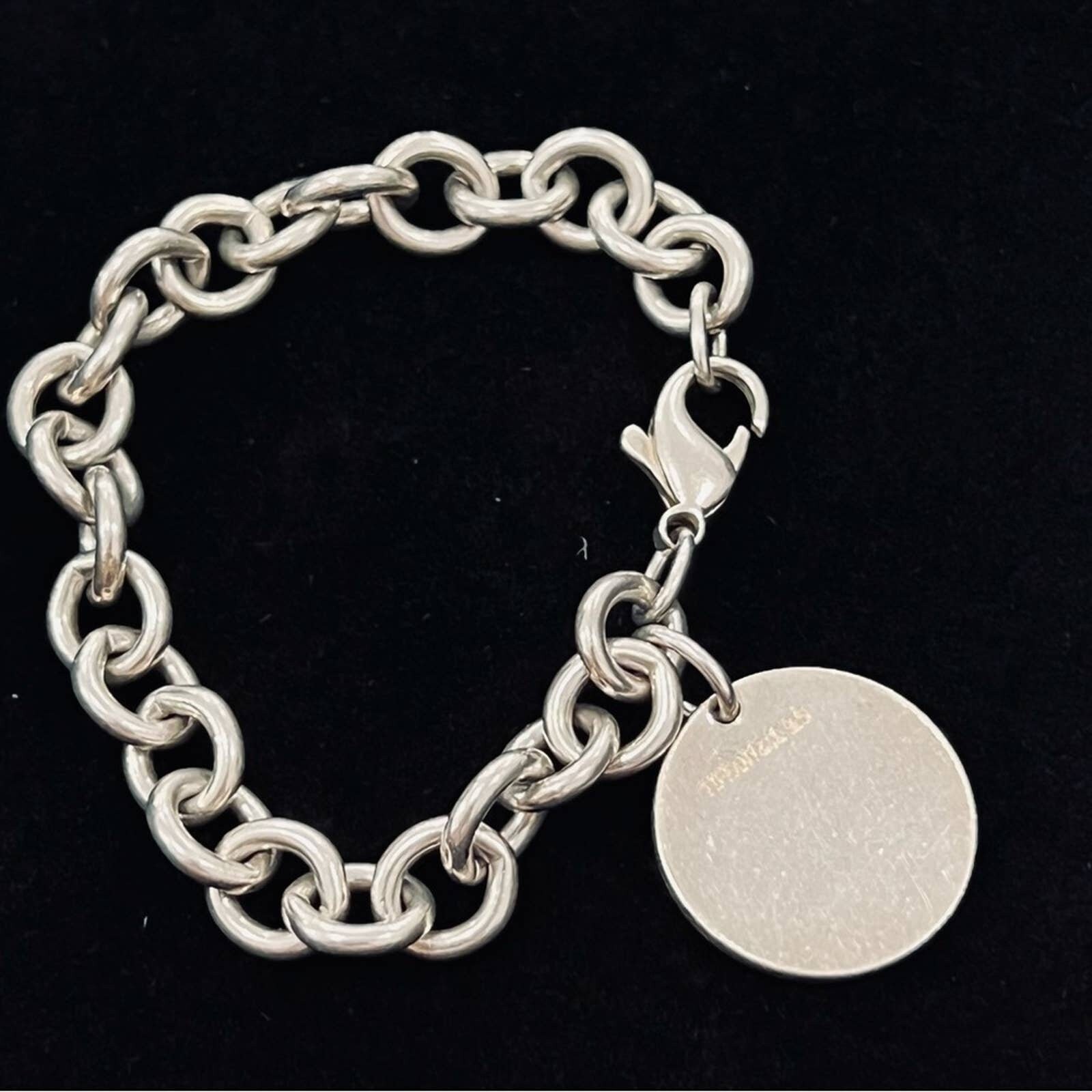 A Tiffany & Co. Vintage Round Tag Return to Tiffany Silver