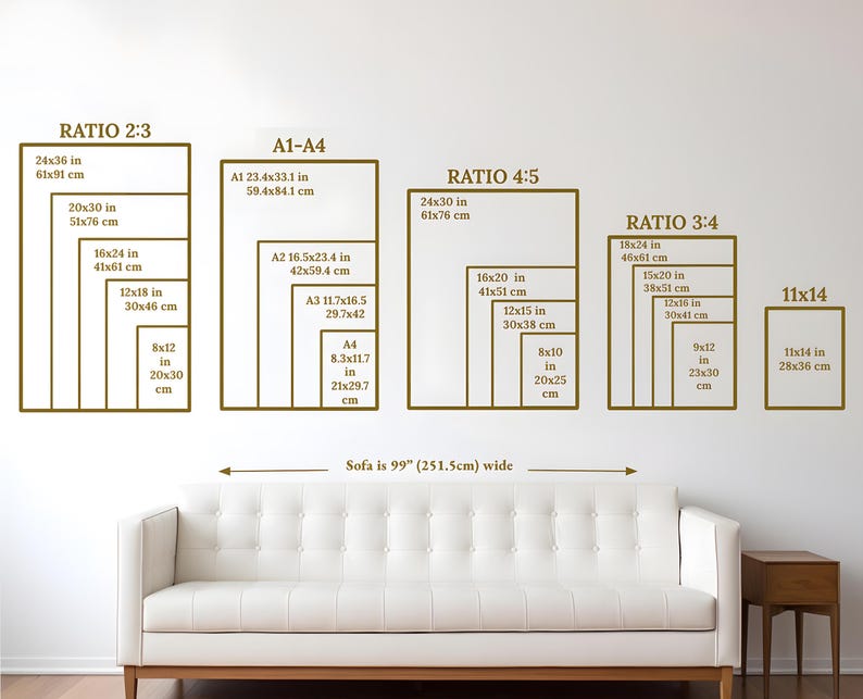 May include: A white sofa with a wooden frame is positioned below a wall displaying various rectangular frames with size ratios and dimensions in inches and centimeters. The sofa is 99 inches (251.5cm) wide.