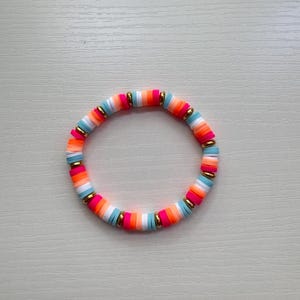 Colorful pink, orange, white, blue, and gold summer heishi clay beads bracelet jewelry