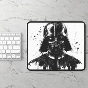 May include: Black and white illustration of Darth Vader's helmet with splattered paint effects on a white background.