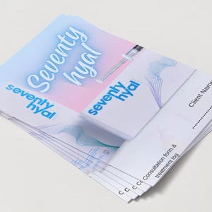 May include: A stack of white paper forms with the text "seventy hyal" in blue and pink. The forms have a line for "Client Name" and the text "Consultation form & treatment log".