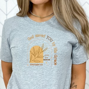Saved by grace tee, Christian Tshirts, Christian Apparel, Ephesians 2 shirt Bible verse t shirt, Saved Christian gifts, God is good t-shirt