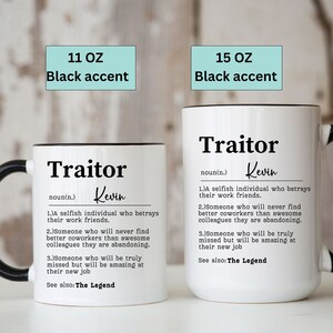 May include: Two white ceramic mugs with black handles and black rims. The mugs have a definition of the word "Traitor" with the name "Kevin" written in cursive. The mugs are available in 11 oz and 15 oz sizes.