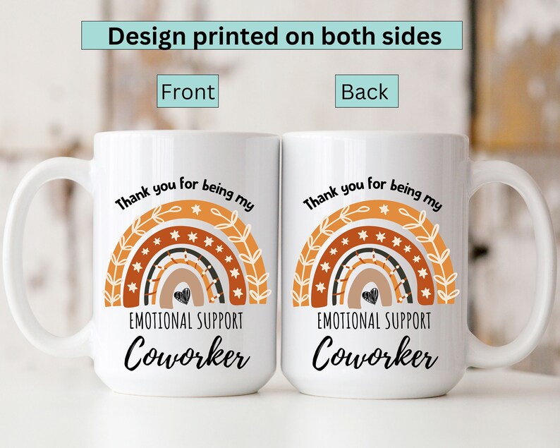 May include: White ceramic mug with a rainbow design and the text "Thank you for being my Emotional Support Coworker". The design is printed on both sides of the mug.