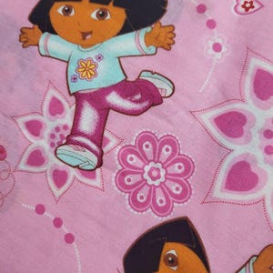 Sale Shop Closing 1 yard Pink Dora the Explorer and Boots   Free shipping over 35 dollars