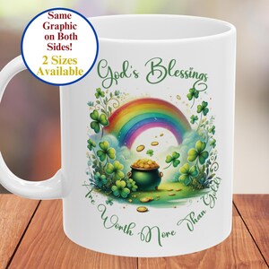 May include: White ceramic mug with a rainbow, pot of gold, and shamrocks. The text reads "God's Blessings Are Worth More Than Gold!"