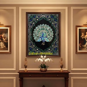 May include: A framed peacock mosaic art piece with a black background, framed by a dark brown border. The peacock features blue and green details. The text "Craftmen international" is at the bottom.