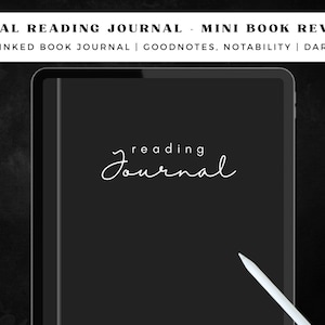 May include: A black digital tablet with a white stylus. The screen displays the text "reading journal" in a handwritten font.