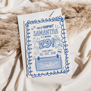 May include: A blue and white invitation card with the text "Holy Schmidt! Samantha is turning 29! Come party all day, son!" The card has a doodle-style design with illustrations and is set against a white background.