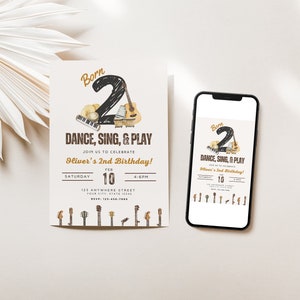 Peut inclure: Une carte d'invitation blanche sur le thème musical noir et or pour un 2ème anniversaire. La carte indique "Born 2 Dance, Sing, & Play" et "Oliver's 2nd Birthday!" avec la date et l'heure de la fête. La carte est à côté d'un smartphone avec la même invitation à l'écran.