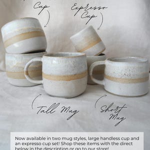 Brown and white ceramic mug, handcrafted with earthy tones, ideal for rustic kitchen and coffee lovers.