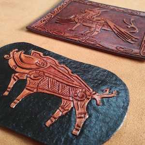 Viking inspired leather tooling Bore and dragon pattern