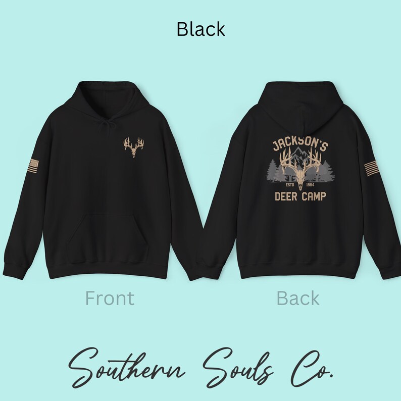 May include: Black hoodie with a front chest design of a deer antler and a back design that reads "Jackson's Deer Camp Est. 1964". The hoodie has a kangaroo pocket and a hood. The text "Southern Souls Co." is at the bottom.
