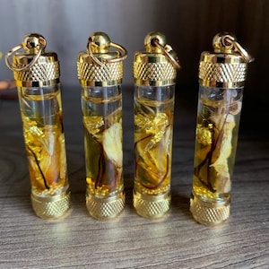 Powerful Charm Oil Pendant Love & Luck Attraction Thai Love Charm Amulet with Love Roots 108 Flower Love Oil : Thai Magic Love Amulet