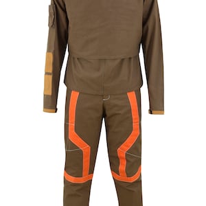 May include: A brown jumpsuit with orange accents. The jumpsuit has long sleeves and a collared neckline. The trousers have a straight leg and are accented with orange stripes.