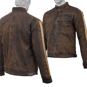 May include: A brown denim jacket with gold accents on the sleeves and a patch on the chest. The jacket has a zip closure and two pockets.