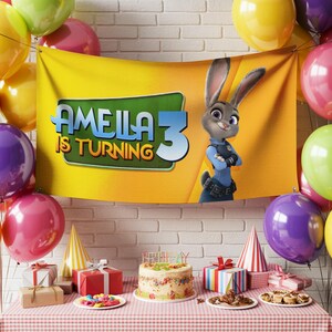 May include: A birthday party scene with a banner that reads "Amelia is Turning 3" featuring a cartoon character. Colorful balloons, gifts, a cake, and party hats are on a table covered with a red and white checkered tablecloth.