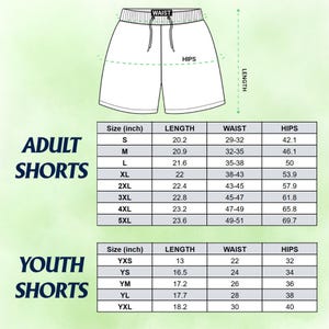 May include: A size chart for adult and youth shorts featuring a line drawing of shorts with labels for waist, hips, and length. Two tables provide measurements in inches for sizes S through 5XL for adults and YXS through YXL for youth.