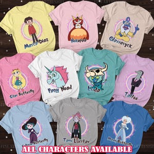May include: A collection of colorful t-shirts featuring various characters from the animated series Star vs. the Forces of Evil. Each shirt displays a different character with their name, including Marco Diaz, Star Butterfly, and Tom Lucitor. The text "ALL CHARACTERS AVAILABLE" is at the bottom.