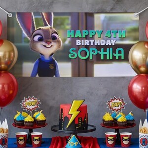May include: A birthday party scene with a banner featuring Judy Hopps from Zootopia and the text "HAPPY 4TH BIRTHDAY SOPHIA." The table is decorated with a cake, cupcakes, balloons, and superhero-themed cups.