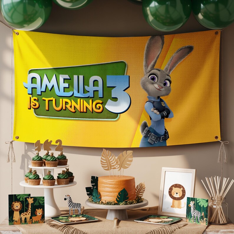 May include: A birthday party scene with a banner featuring Judy Hopps from Zootopia and the text "Amelia is Turning 3." The scene includes cupcakes, a cake, and decorative items with animal illustrations. Green balloons are visible in the background.