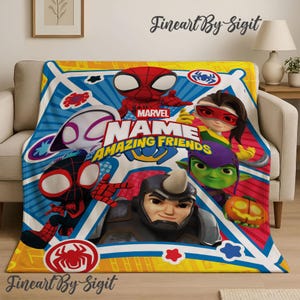 May include: A Marvel "Amazing Friends" blanket featuring various cartoon characters, including Spider-Man, Rhino, and others. The blanket has a colorful design with a yellow, blue, and red color scheme, and the Marvel logo is visible. The blanket is displayed on a beige couch.
