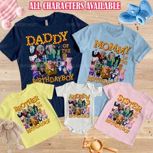 May include: A collection of colorful t-shirts and a onesie with cartoon character designs. The shirts are navy, light blue, yellow, and pink, with text that reads "Daddy", "Mommy", "Brother", and "Sister" of the Birthday Boy. The onesie says "Andrew 3".