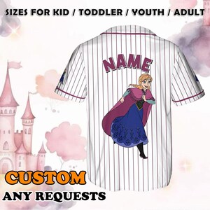 May include: White baseball jersey with pink and white stripes. The back of the jersey features a cartoon image of a girl with blonde hair wearing a blue dress and a pink cape. The text "NAME" is printed in pink above the image. The text "CUSTOM ANY REQUESTS" is printed in orange at the bottom of the image.