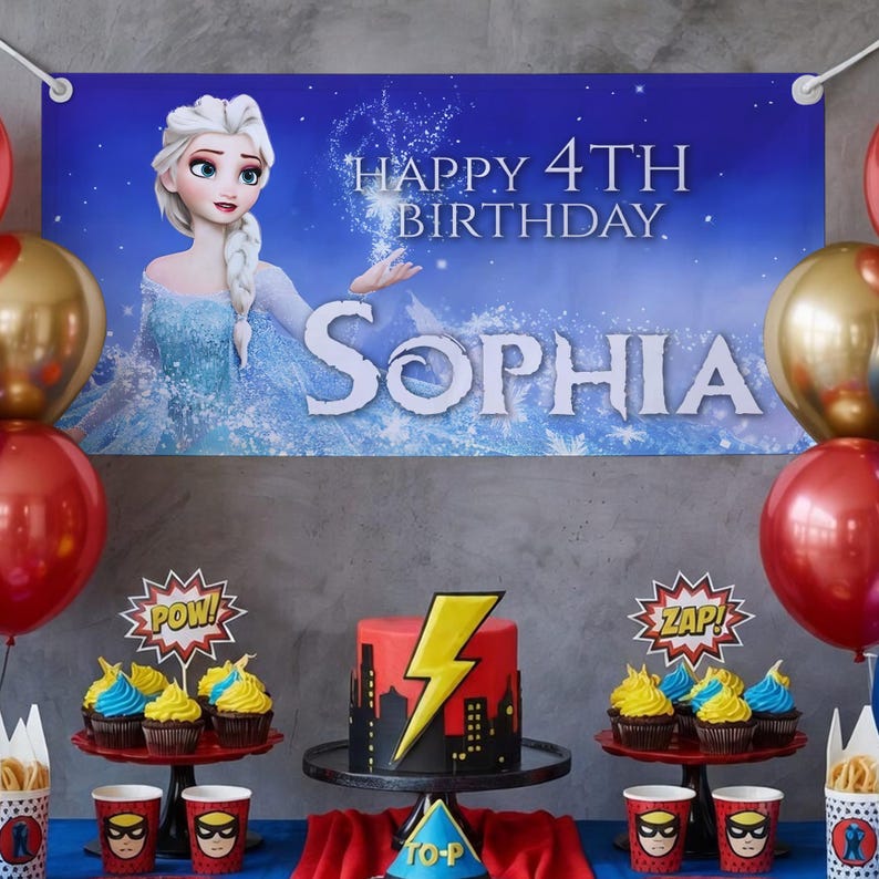 May include: A birthday party setup with a banner featuring a cartoon character and the text "HAPPY 4TH BIRTHDAY SOPHIA." The table includes a red and yellow cake with a lightning bolt design, cupcakes, and superhero-themed cups and decorations. Balloons in red and gold complete the festive scene.