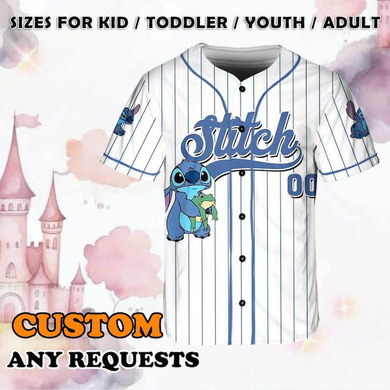 May include: White baseball jersey with blue stripes and a blue Stitch character holding a green frog. The jersey has the word "Stitch" in blue cursive lettering and the number "00" in blue. The text "CUSTOM ANY REQUESTS" is at the bottom of the image.