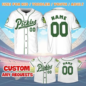 May include: White baseball jerseys with green accents and the word "Pickles" on the front. The jerseys have the number "00" and are customizable. The text "SIZES FOR KID / TODDLER / YOUTH / ADULT" is at the top.