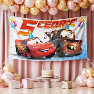 May include: A birthday banner featuring Lightning McQueen and Mater from the Cars movie, with the name "Cedric" and the number "5". The banner is decorated with balloons and confetti, with a cake and presents in the foreground.