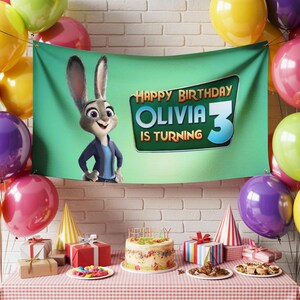 Puede incluir: Una escena de fiesta de cumplea&ntilde;os con una pancarta con Judy Hopps de Zootopia. La pancarta dice "Happy Birthday Olivia 3 is Turning". Globos de colores, regalos, una tarta y gorros de fiesta decoran la mesa. El fondo es una pared de ladrillos.