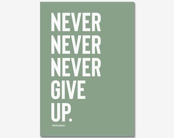 May include: A sage green poster with the text "NEVER NEVER NEVER GIVE UP." in white. The text is attributed to Winston Churchill.