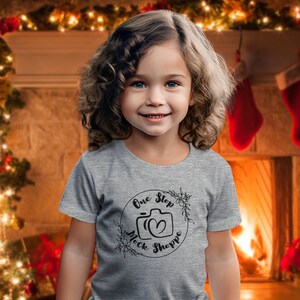 Kids T-Shirt Lifestyle Mockup Athletic Heather Bella+Canvas 3001T Girl Toddler Model in Crewneck Jersey Christmas Tree Winter Holiday Mock