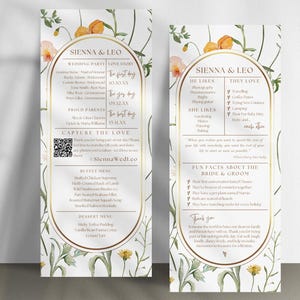 May include: Two-sided wedding program with floral and botanical illustrations. The program includes the names of the wedding party, the menu, and fun facts about the bride and groom. The text is in a classic serif font.