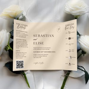 May include: A tri-fold wedding invitation with the names "Sebastian and Elise" in elegant typography. The invitation includes a timeline of the day, accommodation details, and gift information. The background is a soft beige color.