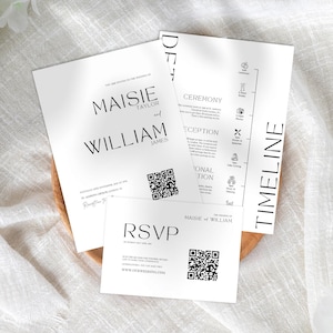 May include: White wedding invitation suite with black text. The invitation includes the names Maisie Taylor and William James, along with a QR code. The suite also includes an RSVP card and a timeline card.
