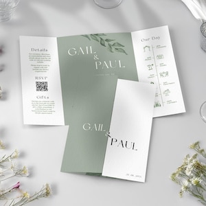 以下が含まれることがあります： セージグリーンと白の三つ折りウェディング招待状。「Gail & Paul」の名前がエレガントなタイポグラフィで表示され、日付「20.08.20XX」も記載されています。詳細、RSVP、ギフト情報も含まれています。