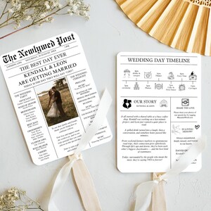 May include: Two wedding day programs with a newspaper theme. One features a photo of the couple and wedding details. The other has a timeline and story of the couple. Both have white ribbons.