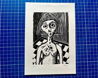 Linocut - portrait of a woman in black and white - art brut