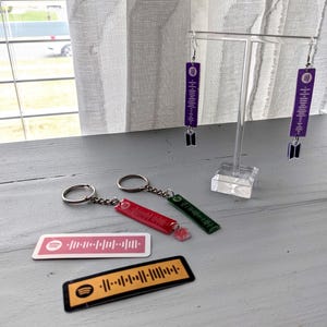 Pendientes, llaveros y pegatinas personalizables con código de Spotify