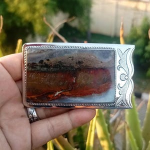 Rare petrified wood buckle head with scenic motif