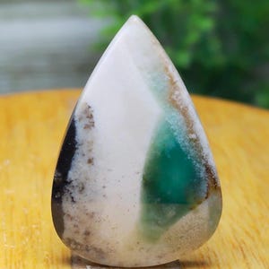 Natural chrysocolla stone. Water drop shaped. 27x18x4mm. Natural green and white color combination.