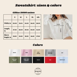 Puede incluir: Imagen de una sudadera unisex Gildan 18000 blanca con opciones de tallas y colores. La tabla de tallas muestra el ancho, el largo y el largo de la manga en pulgadas. Las opciones de color incluyen blanco, rosa, crema suave, gris deportivo, ceniza, verde militar, gris oscuro jaspeado, negro, rojo y azul beb&eacute;.