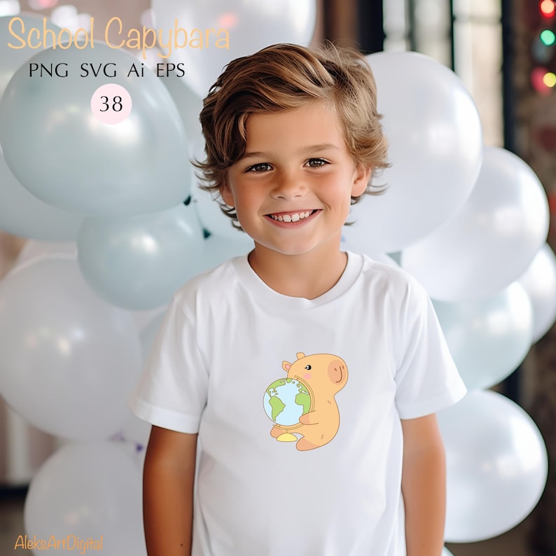 May include: A white t-shirt featuring a cartoon capybara holding a globe. The capybara is light orange with a yellow belly. The text "School Capybara" is at the top of the image. The image also includes the text "PNG SVG AI EPS" and the number "38".