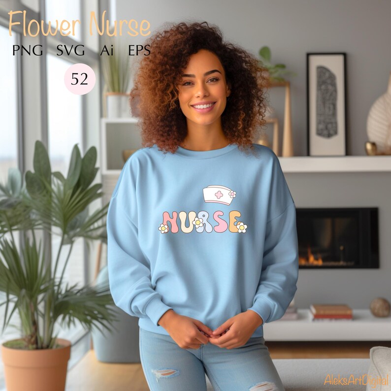 May include: A light blue sweatshirt with the word "NURSE" in colorful letters with flowers around it. A white nurse's hat with a red cross and a pink flower is above the word.