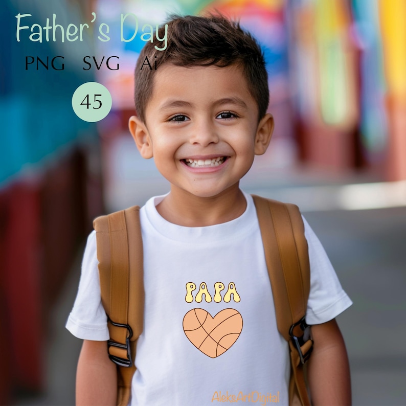 May include: A young child wearing a white t-shirt with the word "PAPA" in yellow bubble letters above a basketball heart design. The child is smiling and wearing a brown backpack. The words "Father's Day" are at the top.