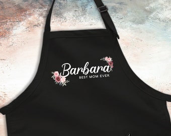 May include: Black apron with a floral design and the text "Barbara Best Mom Ever".