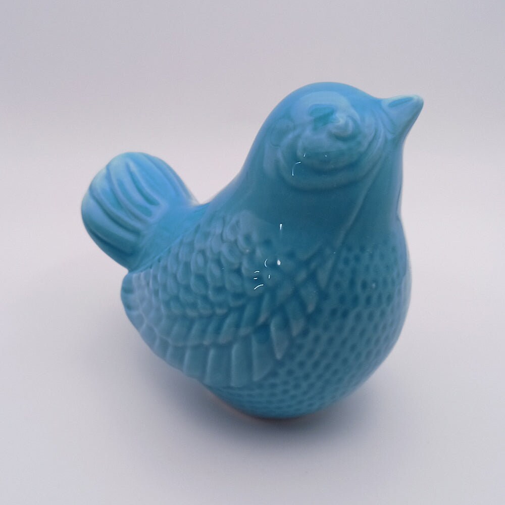 Ceramic Bird looking up Figurine